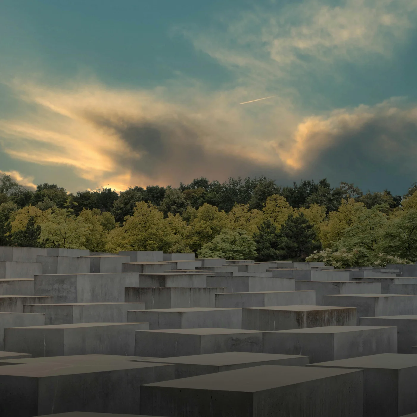 Berliner Sehenswürdigkeiten Sonnenuntergang über dem Holocaust-Mahnmal mit Bäumen im Hintergrund